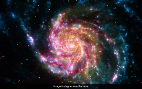 NASA 分享“风车星系”照片，它位于大熊座比我们的银河系大 70%