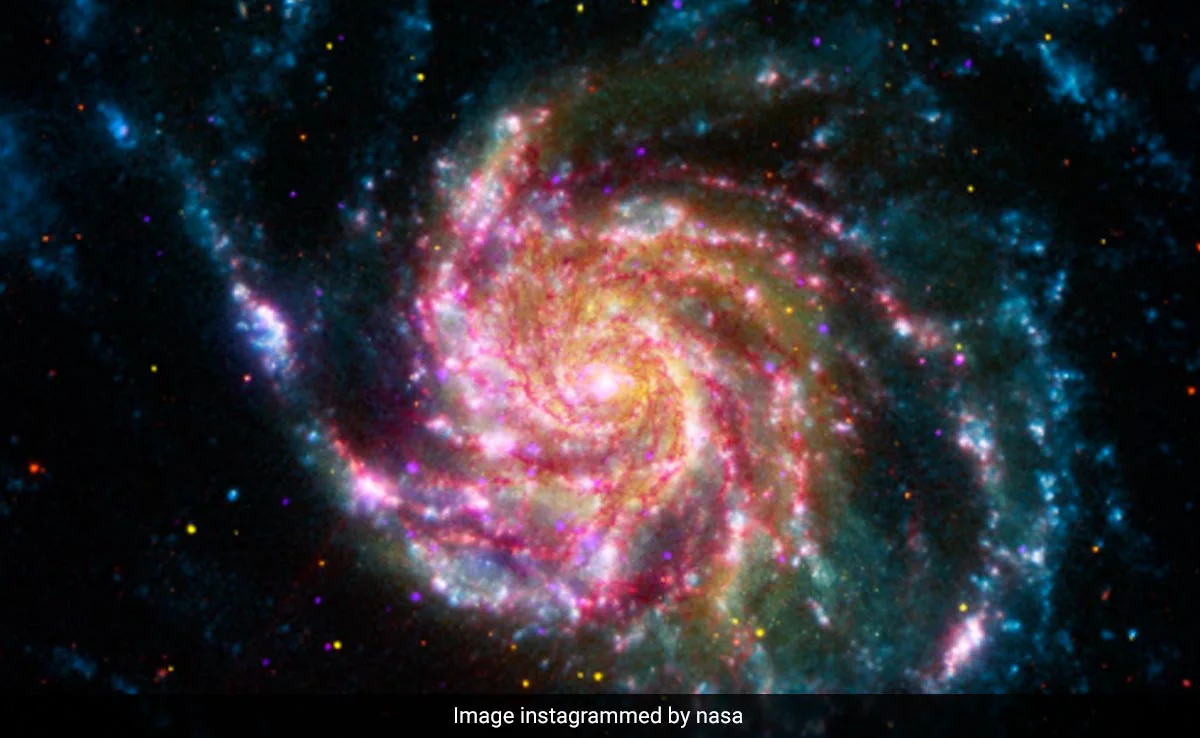 NASA 分享“风车星系”照片，它位于大熊座比我们的银河系大 70%